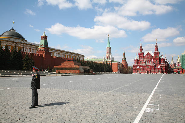 Moscow - Russia, May 28th 2017: large group of army soldiers walking in front of Kremlin and Red Square.