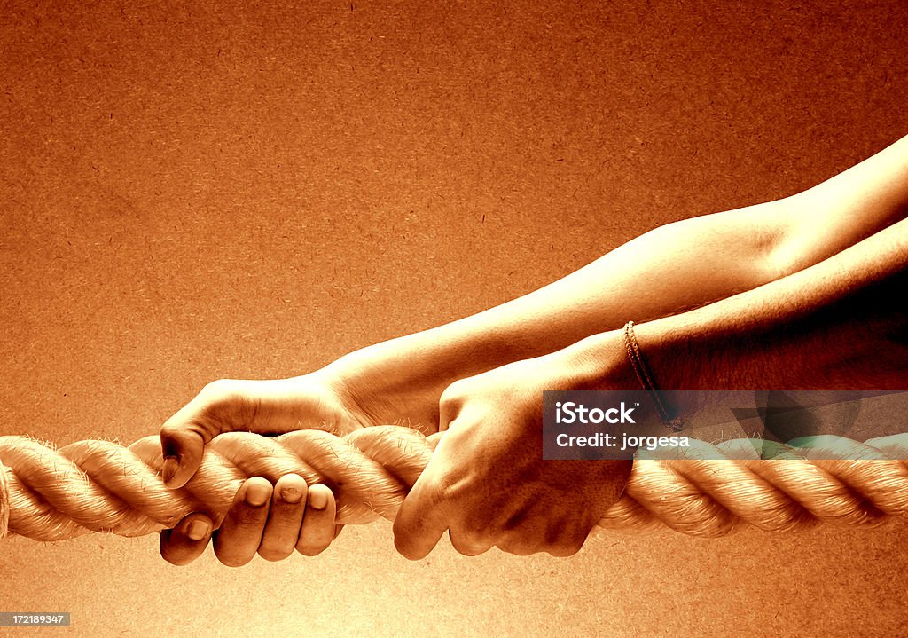 Potenza nella mano - 1 - Foto stock royalty-free di Corda