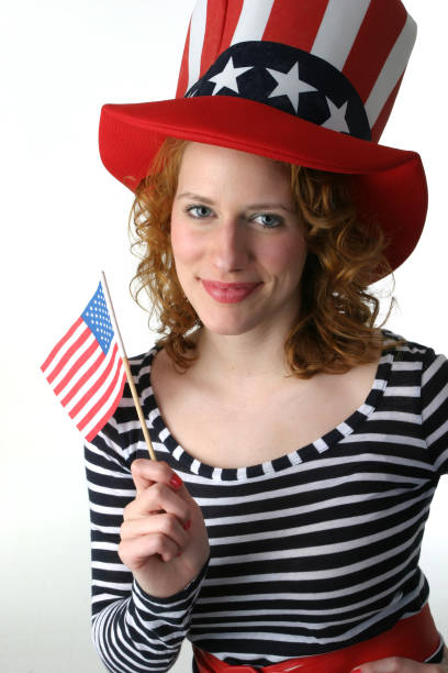 istock Patriotic Woman Waves small US Flag 172189677