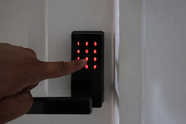 istock Close up human finger press the security code to unlock the door, home security 1721899758