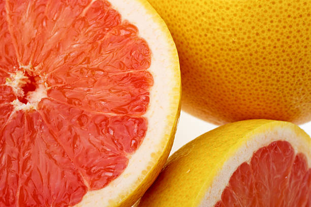 istock Close-up of halved grapefruits 172191220