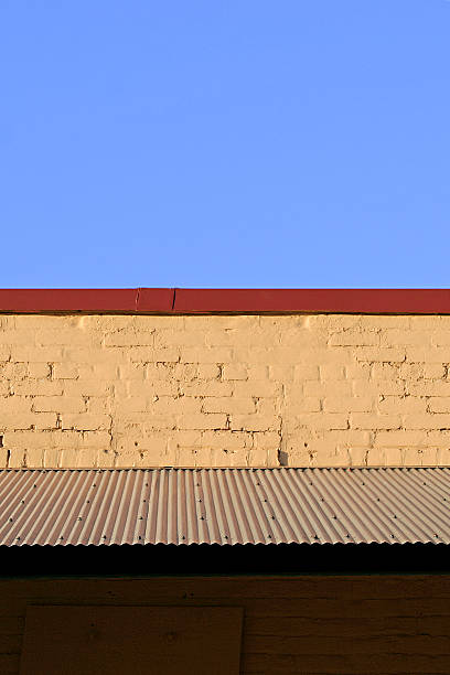 istock Blue Sky and Corrugated Tin Roof 172192315