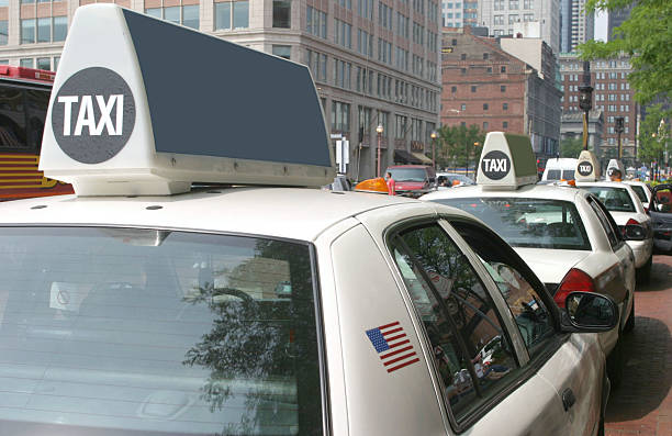 istock Row of White Taxis 172192316