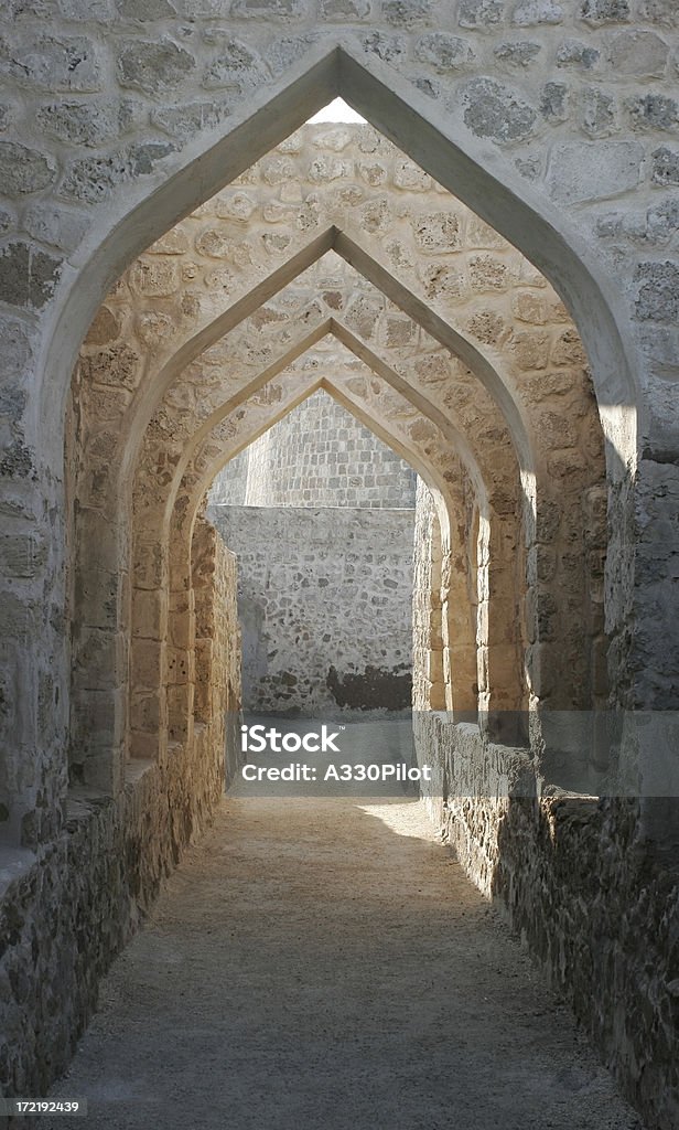 Arabic Arches Historic Arab fort with classical arches. Alley Stock Photo