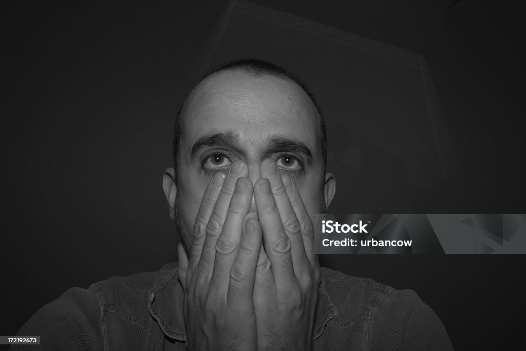 What have I done Man staring in despair Adult Stock Photo