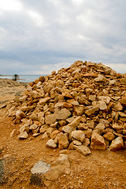 Pile of rocks by the ocean stock photo
