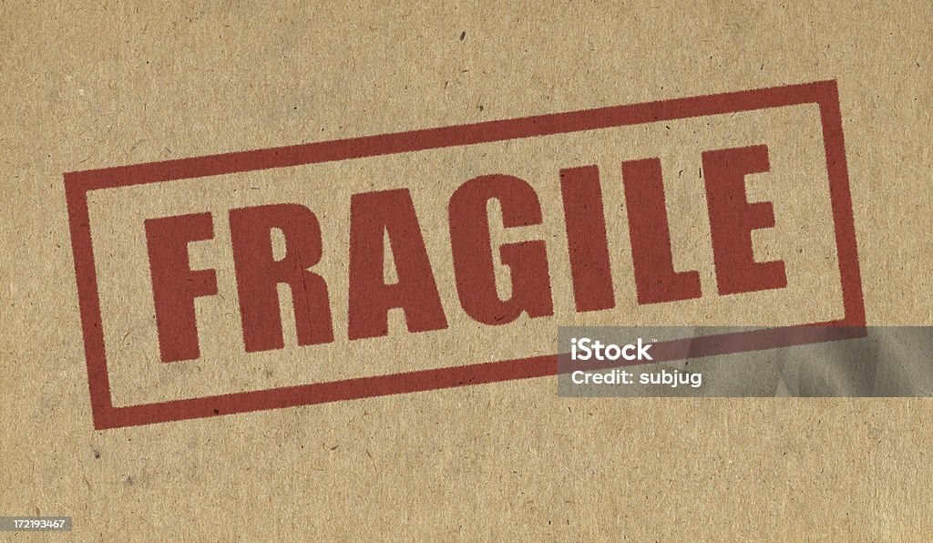 Frágiles señales de cartón - Foto de stock de Amarillo - Color libre de derechos