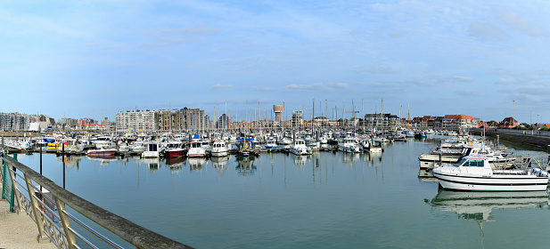 Blankenberge, West-Flanders, Belgium-September 30, 2023: panoramic view, lot of ships, motorboats and sailing yachts moored in Blankenberge marina end September on a sunny Saturday