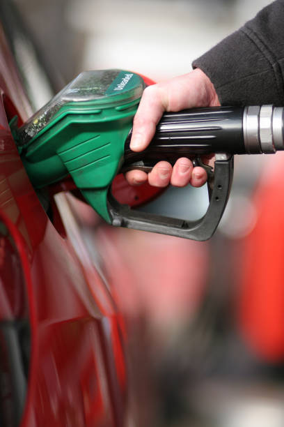 Buying petrol pumping gas global warming car