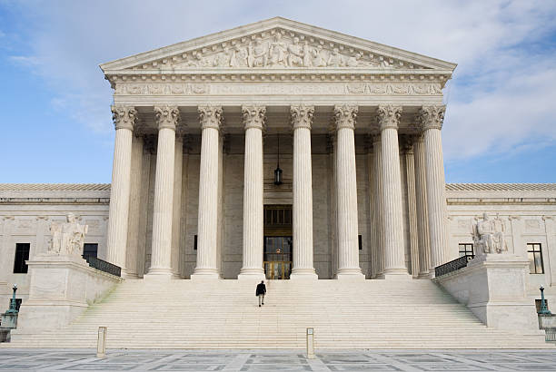 istock US Supreme Court with Man Walking up Steps 172193908