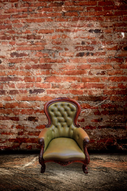 istock Vintage frame and retro leather chair in brick wall room 1721949180