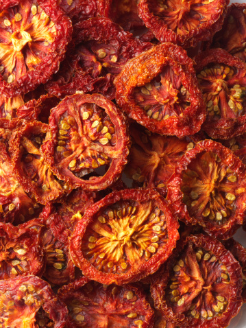 A Beautiful pile of sun dried tomatoes.