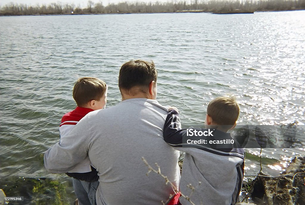Enjoying the lake A father and twin sons relax lakeside while fishing.::: Downloading the above image  I always enjoy seeing how this image is used... Brother Stock Photo