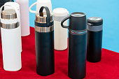 Different styles of travel thermos bottles