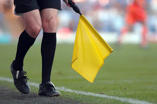 A soccer referee during a game