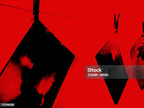Prints Drying In Red Darkroom Stock Photo - Download Image Now - Darkroom, Photography, Photograph