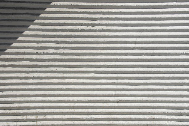 Grooved White Cement Wall stock photo