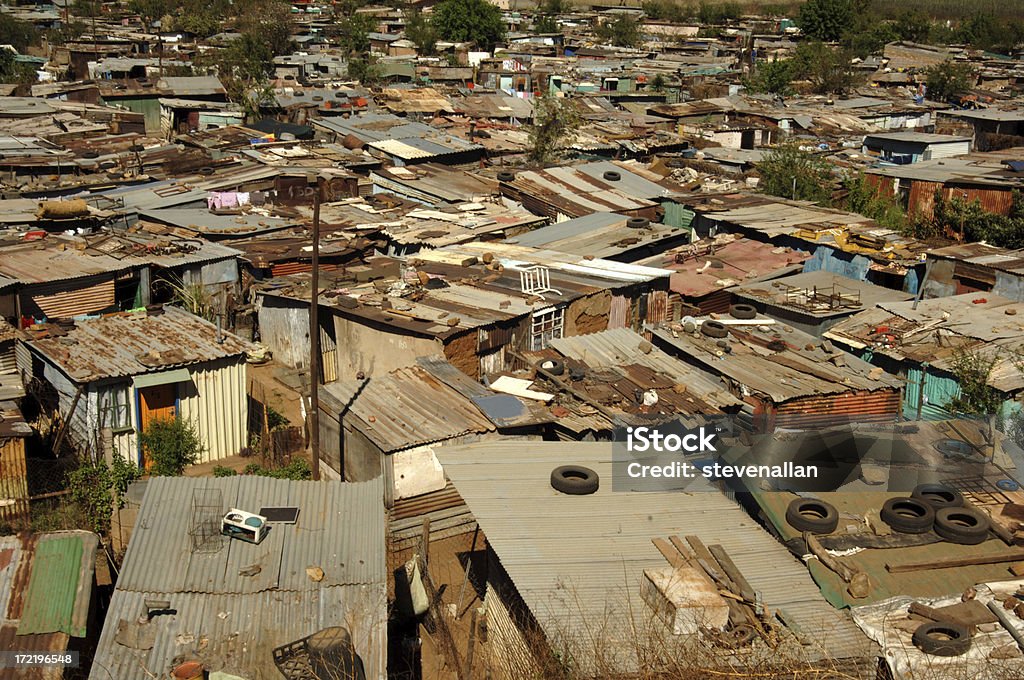 Shantytown shacks Soweto Township South Africa Shantytown Shacks in Soweto South Africa. Soweto is an urban area of the city of Johannesburg in Gauteng, South Africa, bordering the city's mining belt in the south. Its name is an English syllabic abbreviation for South Western Townships. Formerly a separate municipality, it is now incorporated in the City of Johannesburg Metropolitan Municipality, Suburbs of Johannesburg. Apartheid Stock Photo
