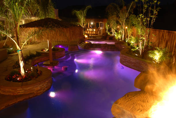 istock Swimming pool at night lite up purple  172196965