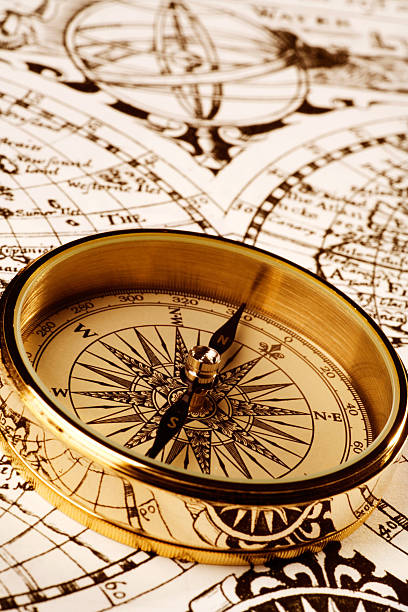 Compass And Map Stock Photo - Download Image Now - Marine Compass,  Navigational Compass, Brass - iStock