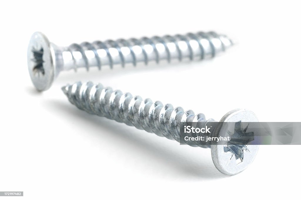 Countersunk Zinc Plated Screw pair "A pair of countersunk zinc-plater screws, sharp focus on the head.Countersunk Zinc-plated Screws:" Screw Stock Photo