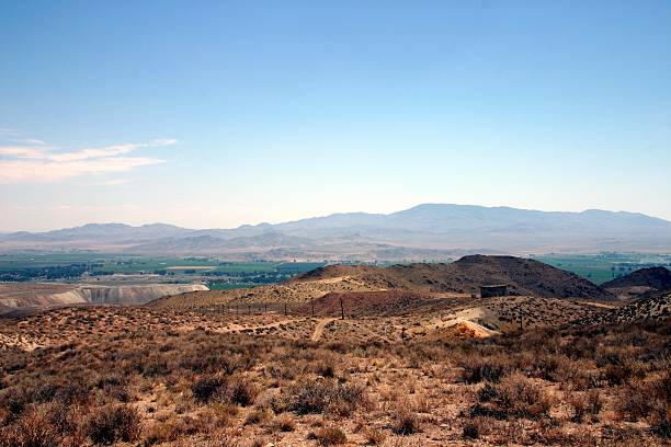 Bluestone-Mason Valley The beautiful lush, green of Mason Valley and the town of Yerington Nevada are contrasted by the stark  rabbit brush stock pictures, royalty-free photos & images