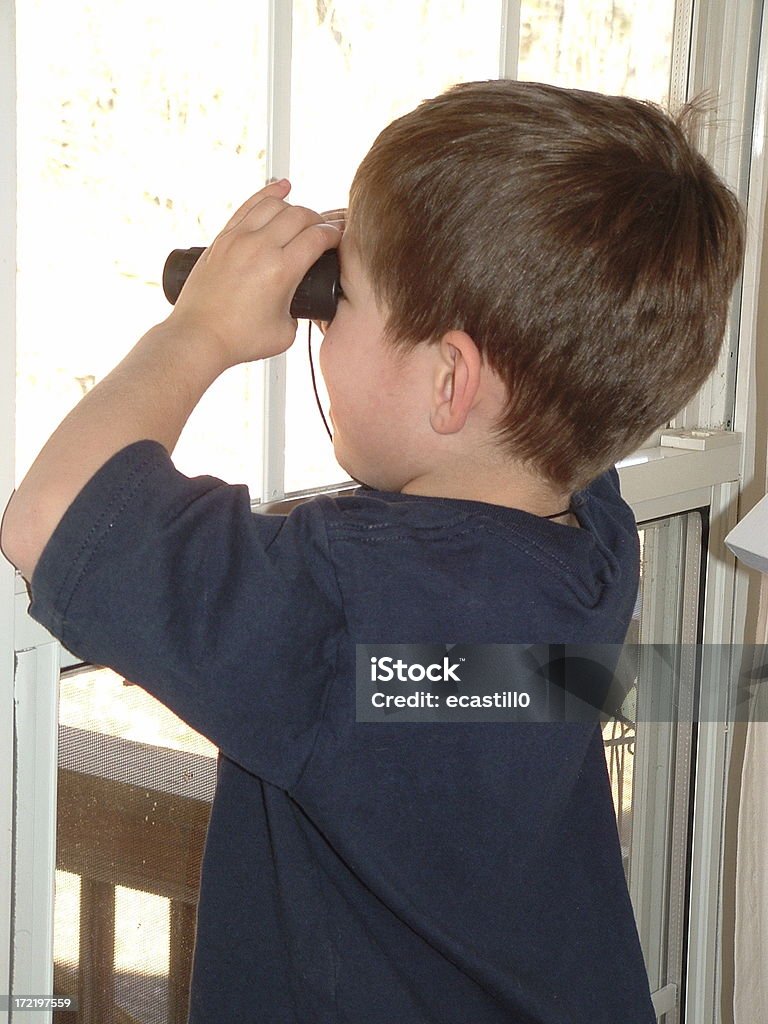 In focus Preschool boy uses binoculars to get a close-up look...Other related images (click image below to view individual photo): Beauty Stock Photo