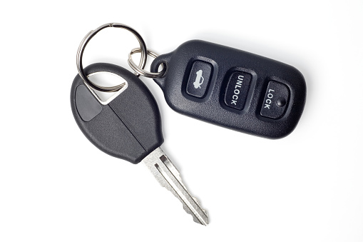 Car keys and remote on white with clipping path.