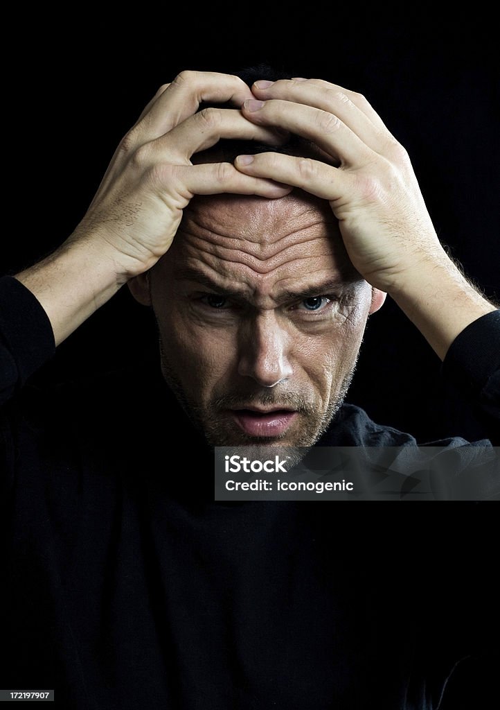 Stress Stressed out man in black. 35-39 Years Stock Photo