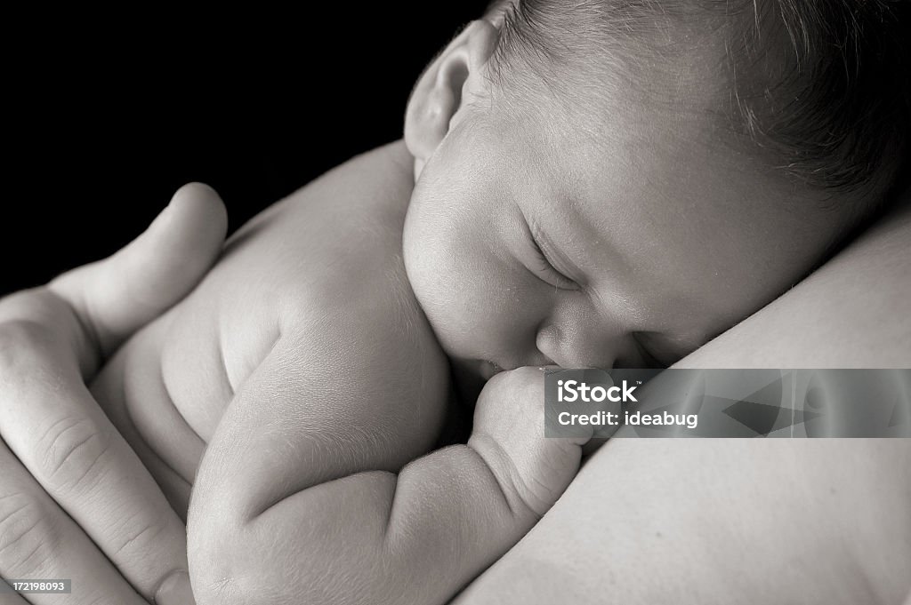 Sleep in Heavenly Peace Newborn baby sleeping peacefully on daddy. Baby - Human Age Stock Photo