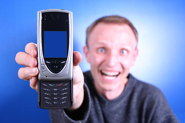 divertente uomo con telefono cellulare - business blurred motion text messaging defocused foto e immagini stock