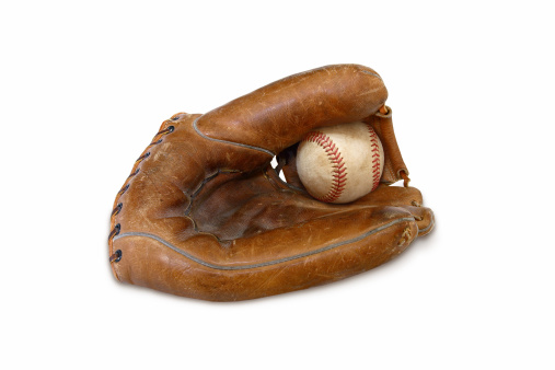 vintage baseball mitt with ball isolated on white