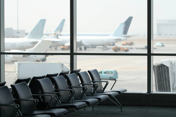 istock Empty airport waiting terminal with view of planes 172198448