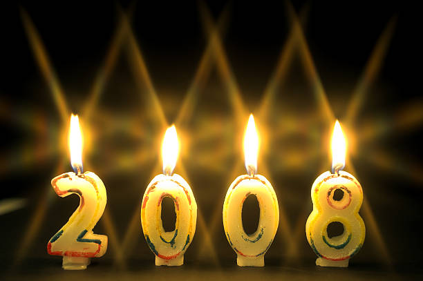 istock 2008 spelled out in lit candles. 172198676