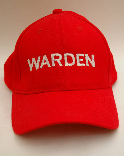 Red Warden Cap "A red warden cap, on a white background" prison guard stock pictures, royalty-free photos & images