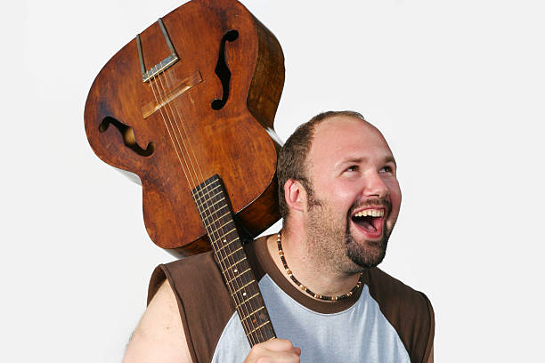 istock Happy man with his guitar. 172198942