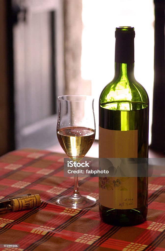 Bottle Of Wine Glass and bottle of white wine Bar - Drink Establishment Stock Photo