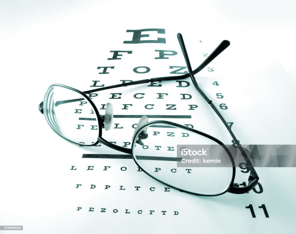 eye chart 2 eyeglasses over eye chart. Cut Out Stock Photo