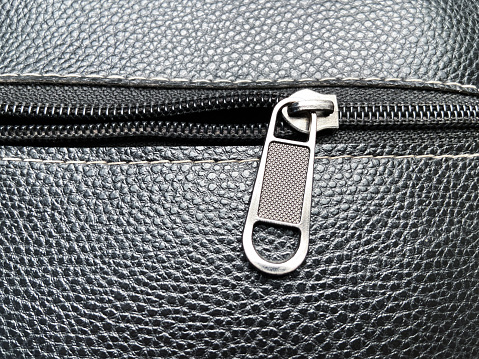 Leather case for keys on a white background