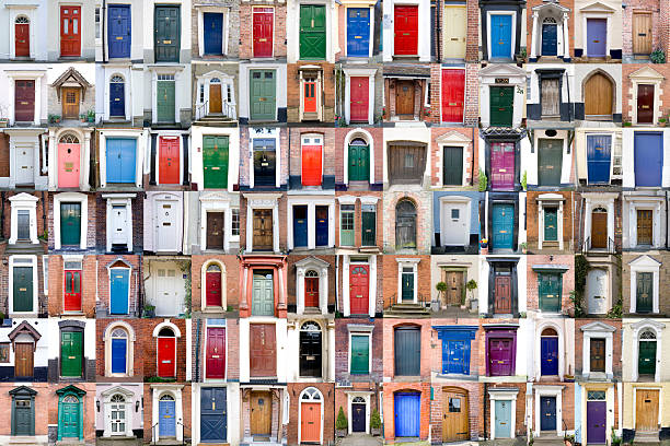 One Hundred Doors XXXLarge One hundred colourful wooden doors of Worcestershire and Shropshire, UK. 98 individual photos (96 of one door and 2 of two doors). blue house red door stock pictures, royalty-free photos & images