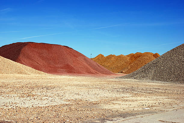 colorful gravel colorful gravel dunes in port hamburg. gravel mound stock pictures, royalty-free photos & images