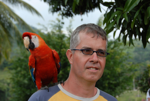 a colorful parrot on my shoulder