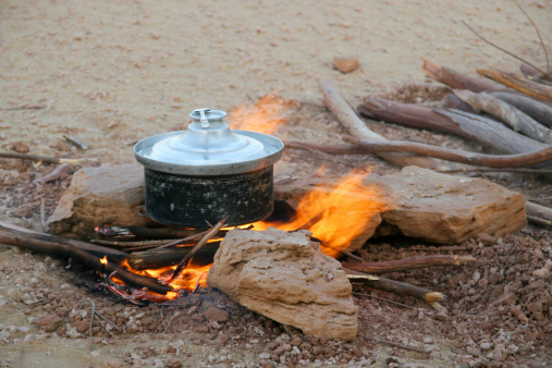 Cooking lunch on the desert ground