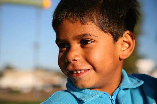 istock Young boy in blue sweater outside in sunshine 172201909