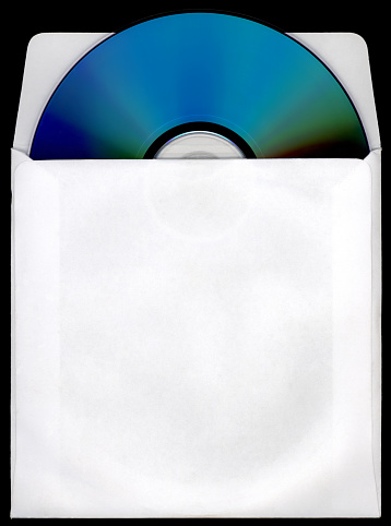 cd/dvd and paper case on black