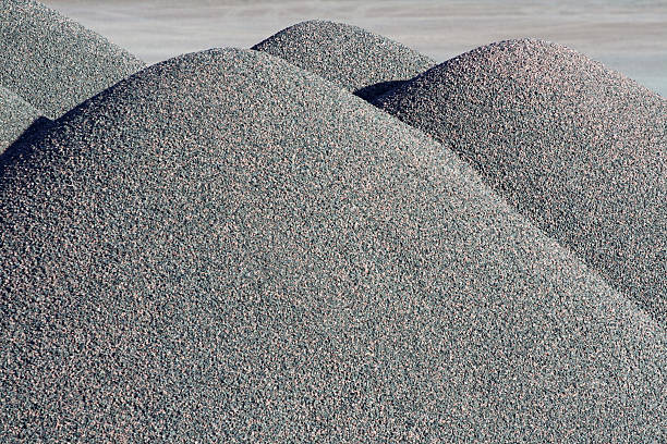 Gravel Abstract - 4 Abstract of gravel piles in a quarry shot in late afternoon sun. gravel mound stock pictures, royalty-free photos & images