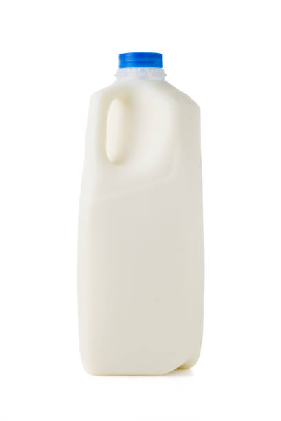 milk jug A jug of milk on white with clipping path. milk jug stock pictures, royalty-free photos & images