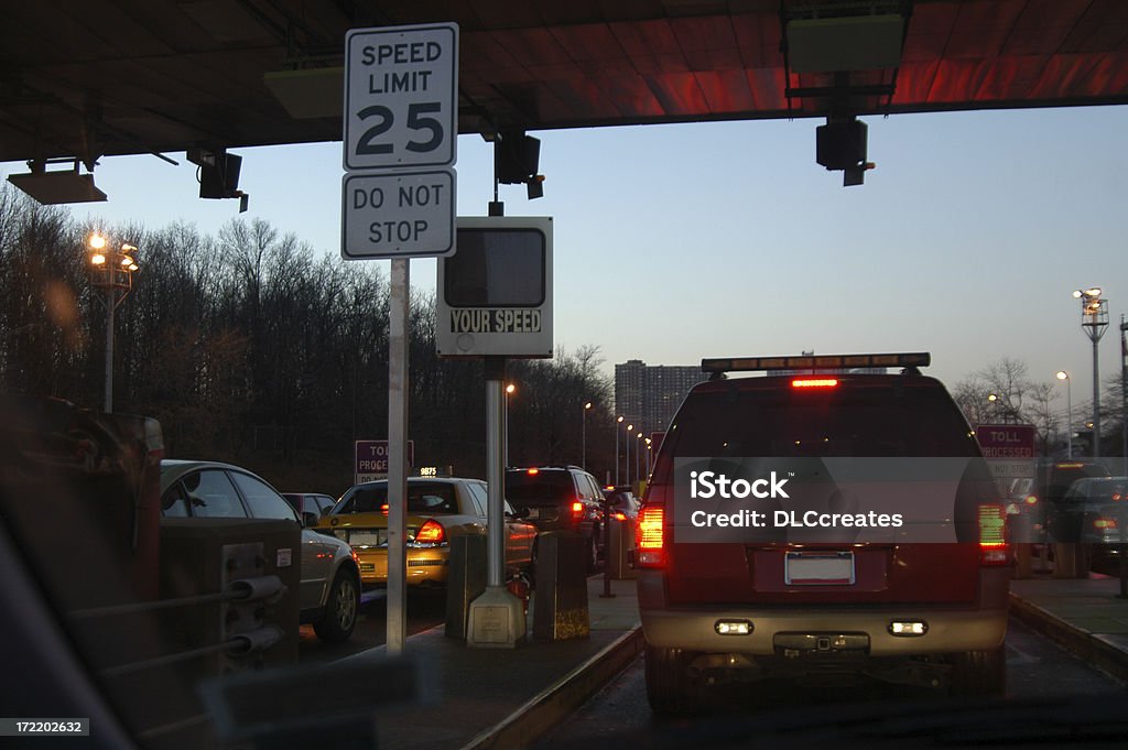 Welcome to the Red Apple! "Toll barrier, slight blur, going into New York City - Manhattan" Toll Booth Stock Photo