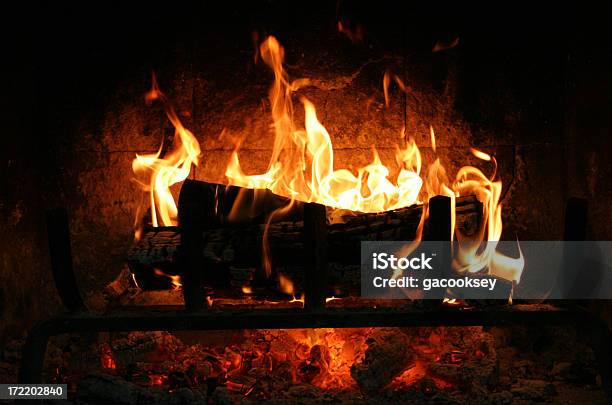 Fire Burning In Fireplace At Night Stock Photo - Download Image Now - Fireplace, Fire - Natural Phenomenon, Log