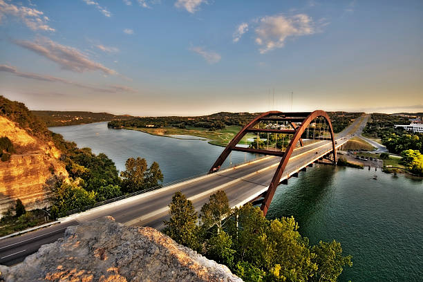 Austin, Texas 360 Bridge Photo of the 360 Bridge, aka Pennybacker Bridge, on Capital of Texas Highway and Lake Austin. austin texas photos stock pictures, royalty-free photos & images